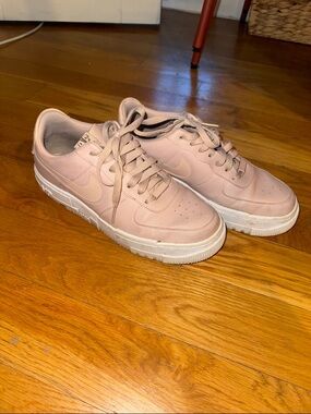 Nike low-top sneakers in blush pink and white